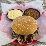 Pork sandwich with macaroni & cheese and baked beans